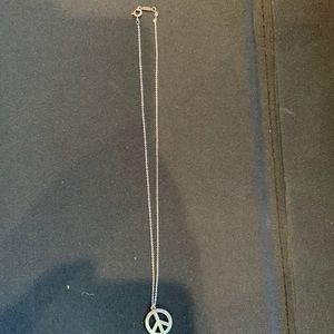 Tiffany & Co peace sign necklace